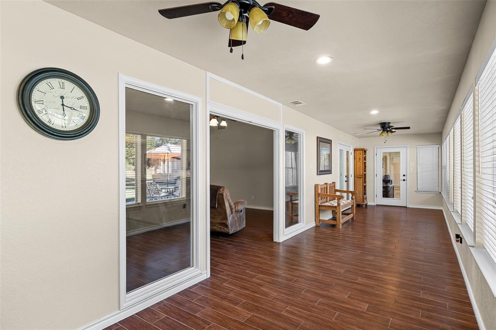 10517 Ravenswood Road Granbury, TX 76049 - Photo 10 of 35 a view of a hallway with elevator