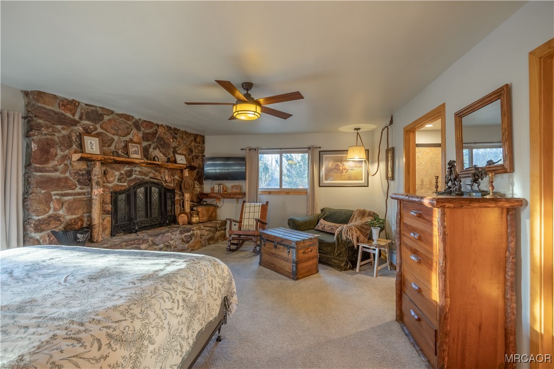 448 Edgemoor Road Big Bear Lake, CA 92315 - Photo 17 of 42 a bed room with a bed and a chair