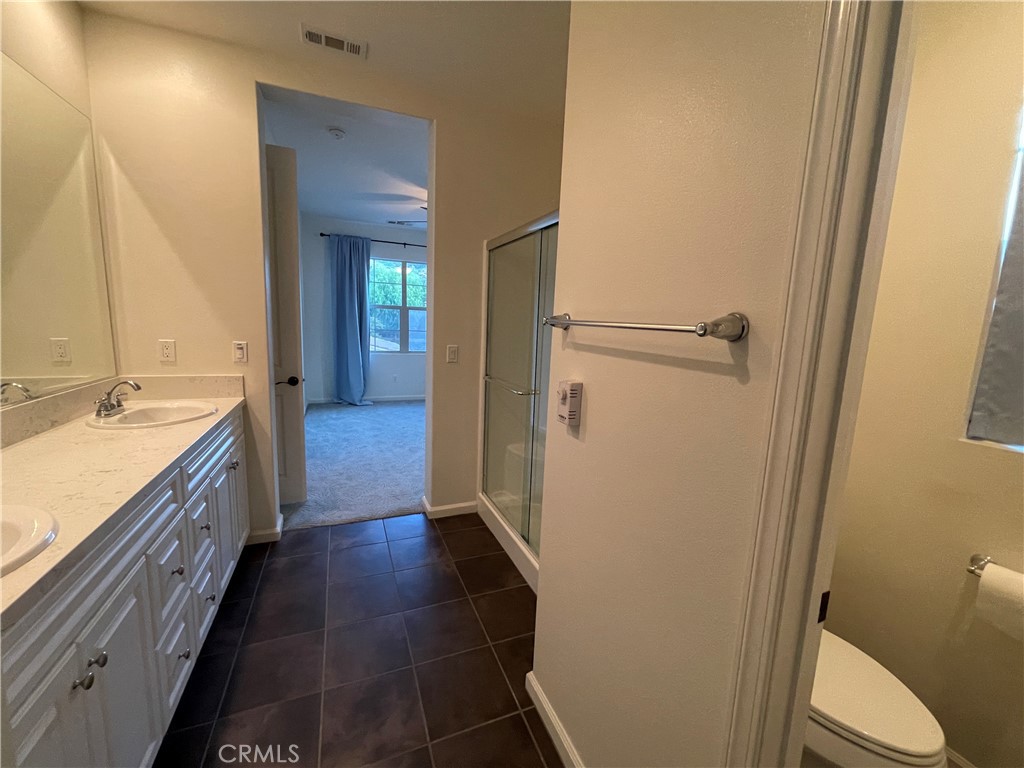 22083 Propello Drive Saugus, CA 91350 - Photo 15 of 24 a bathroom with a sink and toilet