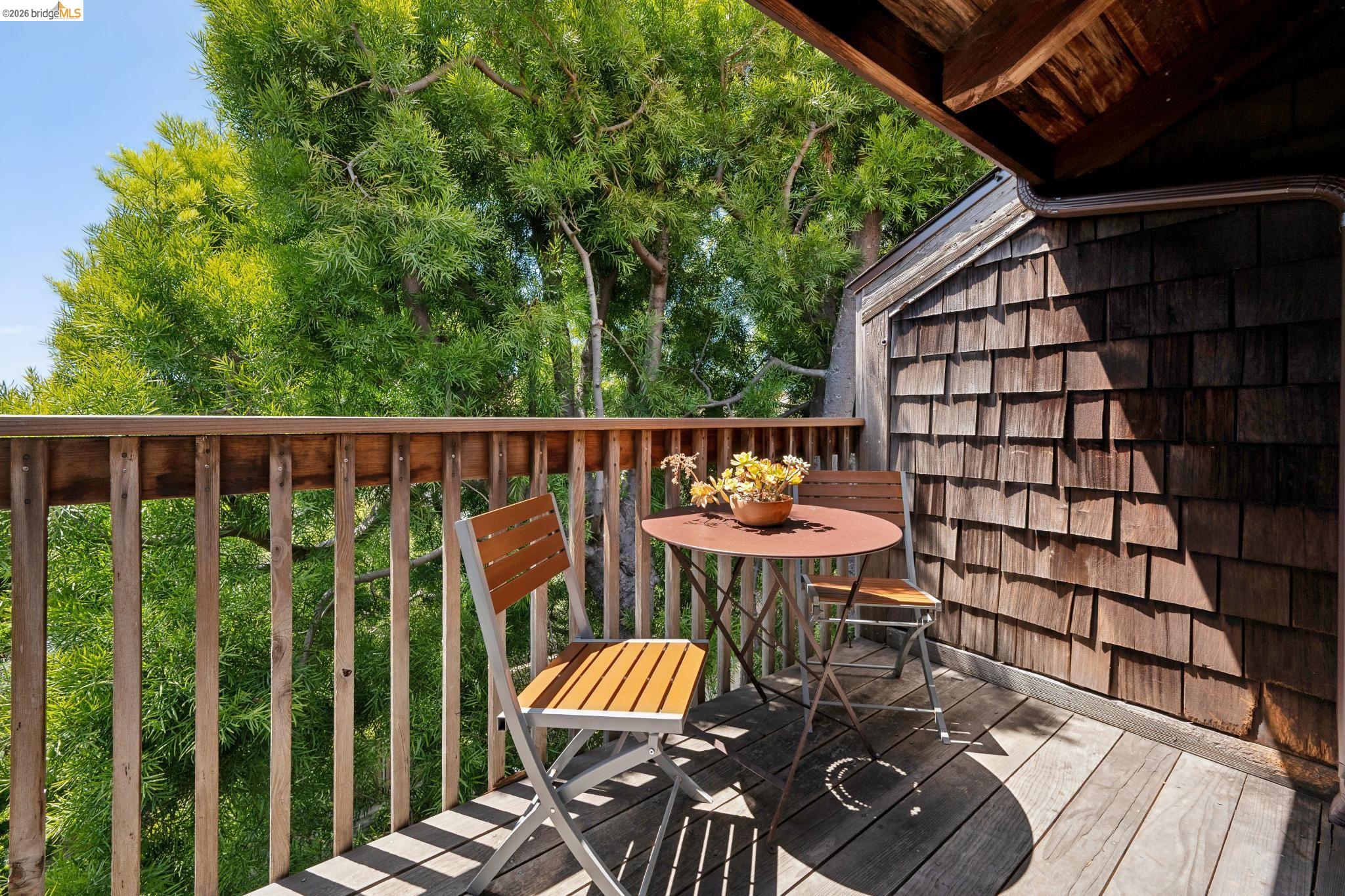 1340 Henry Street Berkeley, CA 94709 - Photo 13 of 52 Private balcony featuring wood-finish decking, wood railing, and wood shingle siding