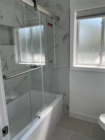 a view of a sink and washer