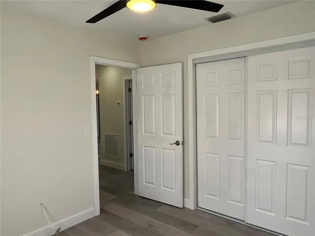 a view of an empty room and window