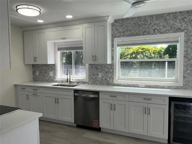 a kitchen with a stove and a microwave