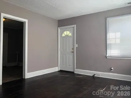 a utility room with sink dryer and washer