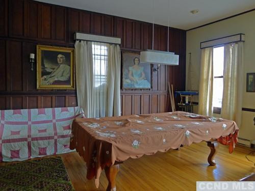 27 Vernon Road Copake, NY 12516 - Photo 3 of 10 a view of a dining room with furniture window and wooden floor