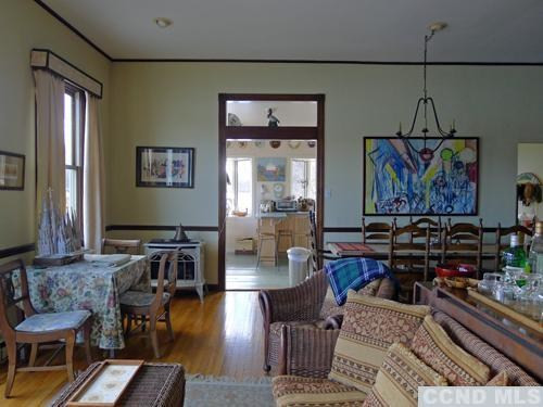 27 Vernon Road Copake, NY 12516 - Photo 6 of 10 a living room with furniture and wooden floor