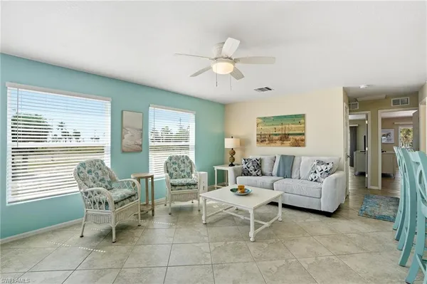 a kitchen with stainless steel appliances granite countertop a stove a refrigerator and a granite counter tops