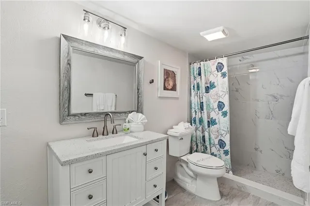 a view of a balcony with furniture