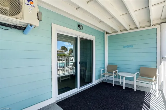 a view of a swimming pool with a patio