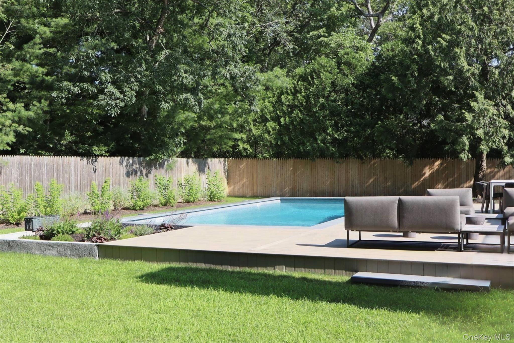 10 Hampton Street Westhampton Beach, NY 11978 - Photo 20 of 25 a view of a garden with a couch