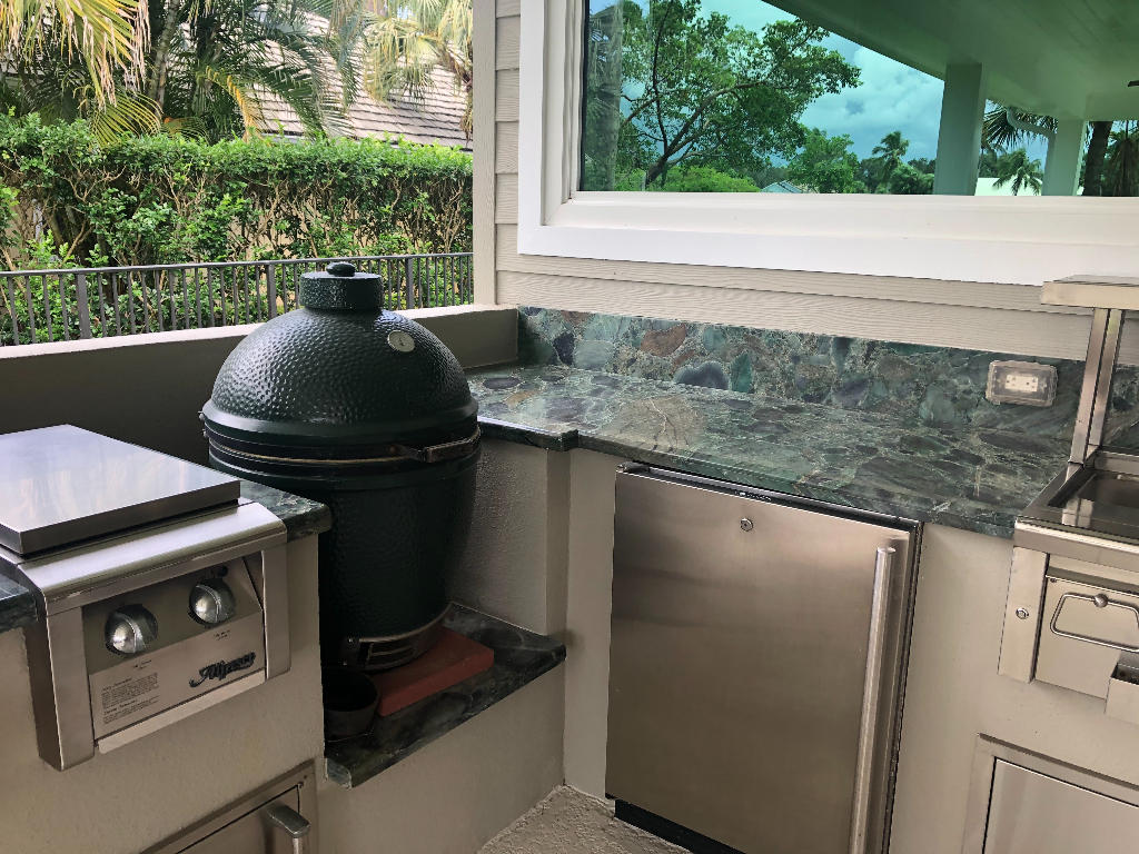18169 Southeast Ridgeview Drive Tequesta, FL 33469 - Photo 19 of 23 a close view of kitchen appliances and cabinets
