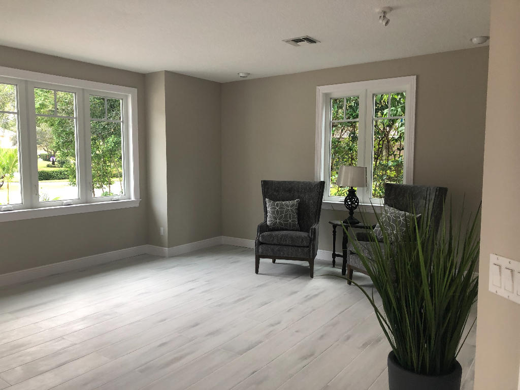 18169 Southeast Ridgeview Drive Tequesta, FL 33469 - Photo 8 of 23 a living room with furniture and a window