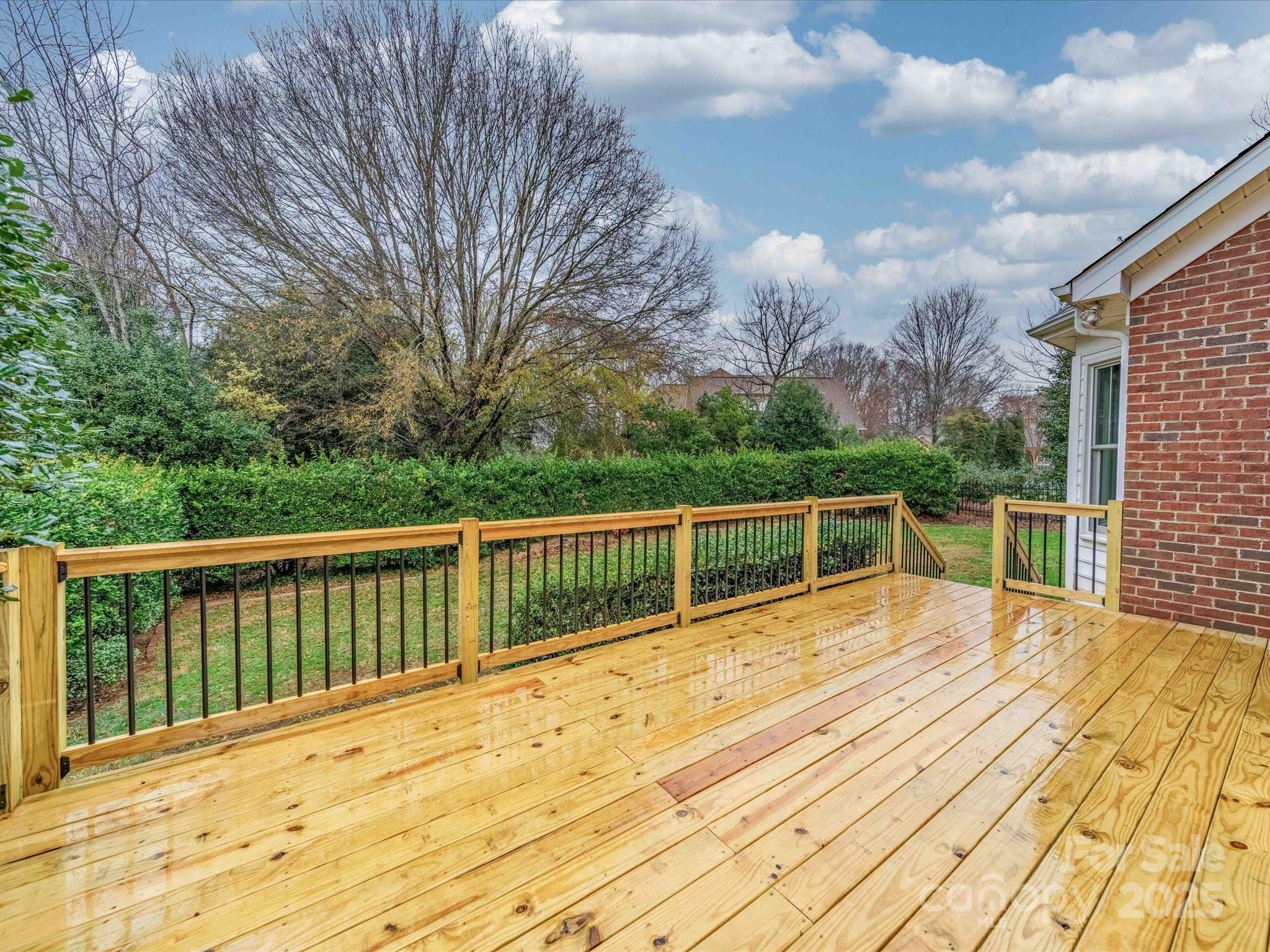 209 Chesterfield Canal Fort Mill, SC 29708 - Photo 23 of 24 a view of balcony with wooden floor and fence