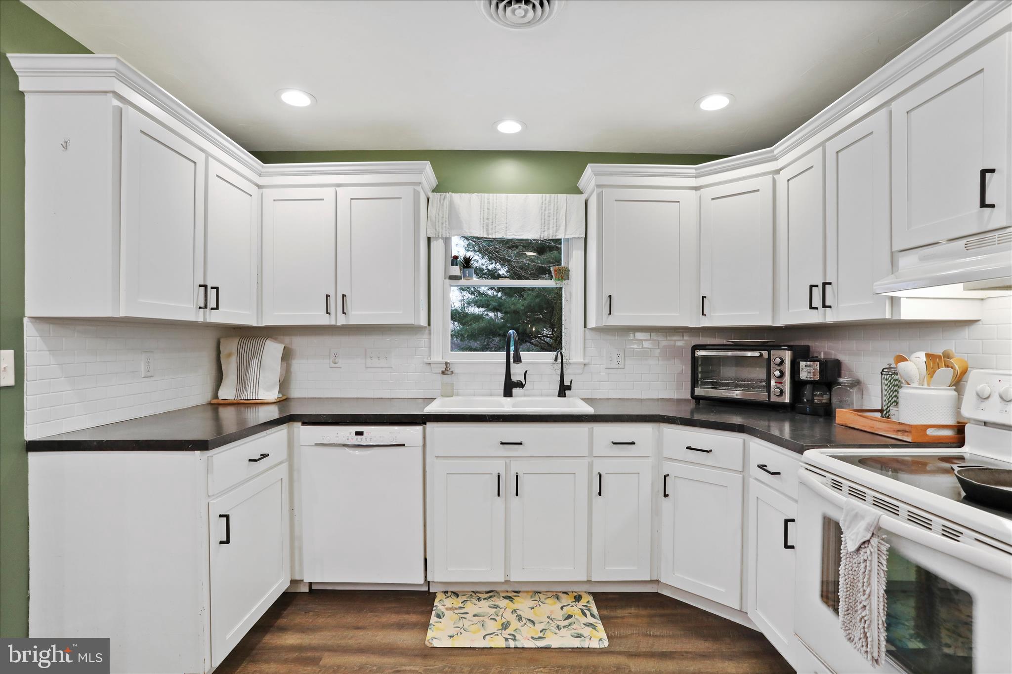 4747 Church Road Chambersburg, PA 17202 - Photo 11 of 49 a kitchen with white cabinets white stainless steel appliances and sink