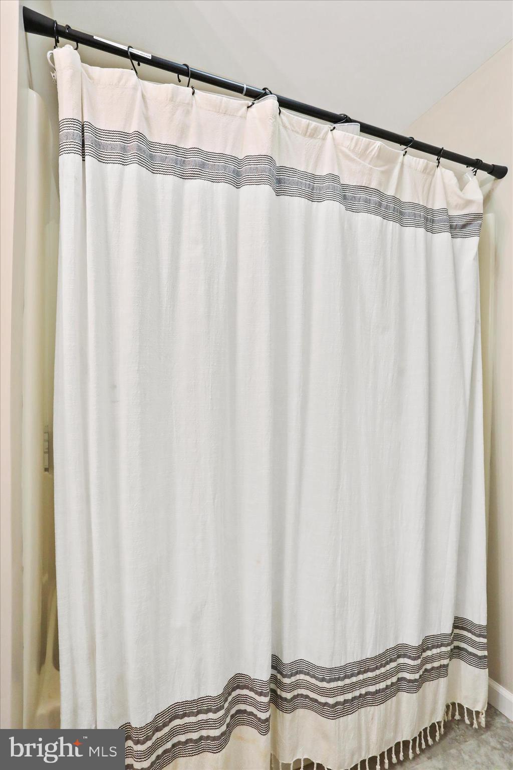 4747 Church Road Chambersburg, PA 17202 - Photo 19 of 49 a view of a window with a shower curtain