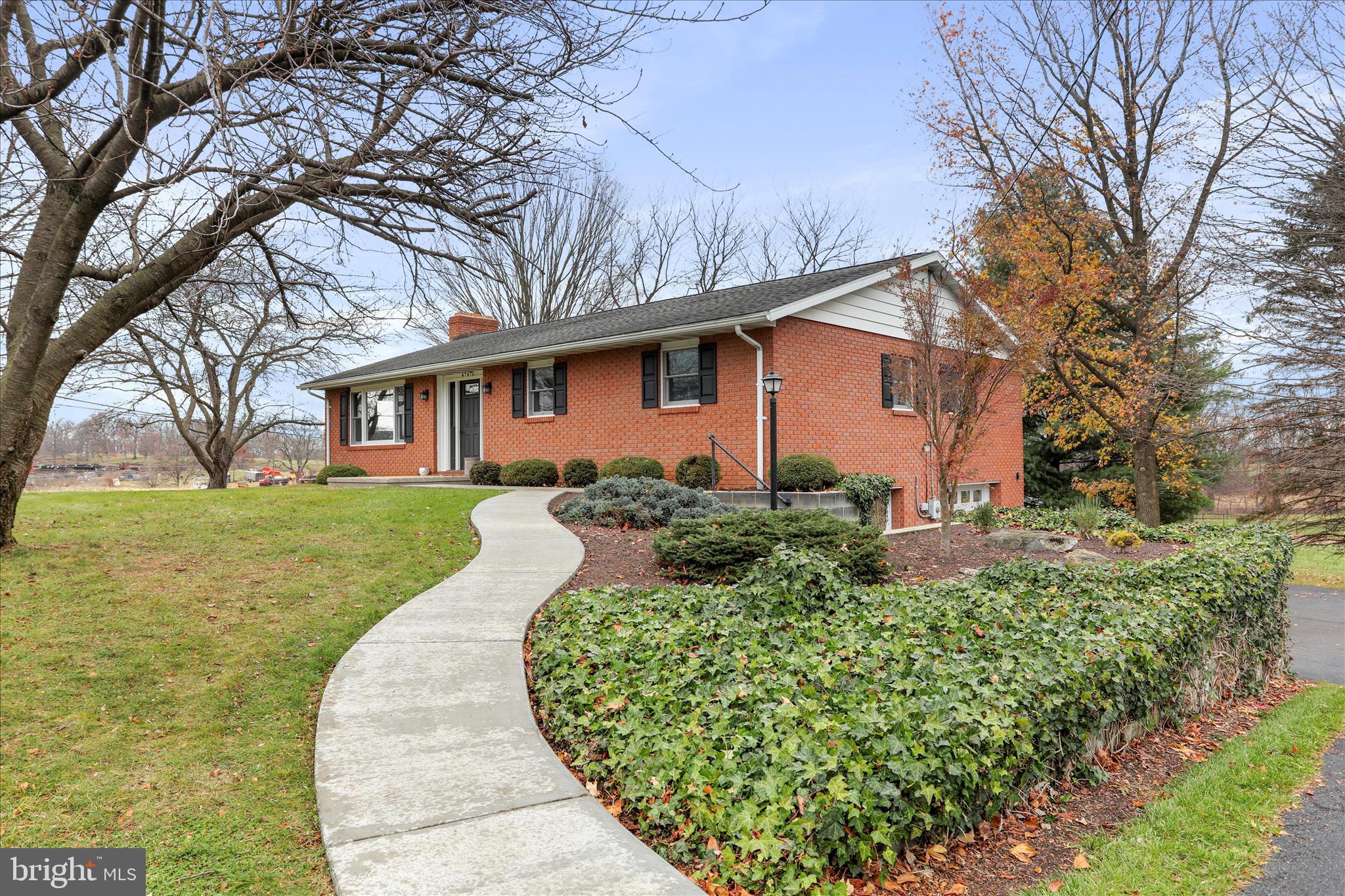 4747 Church Road Chambersburg, PA 17202 - Photo 2 of 49 a front view of a house with a yard