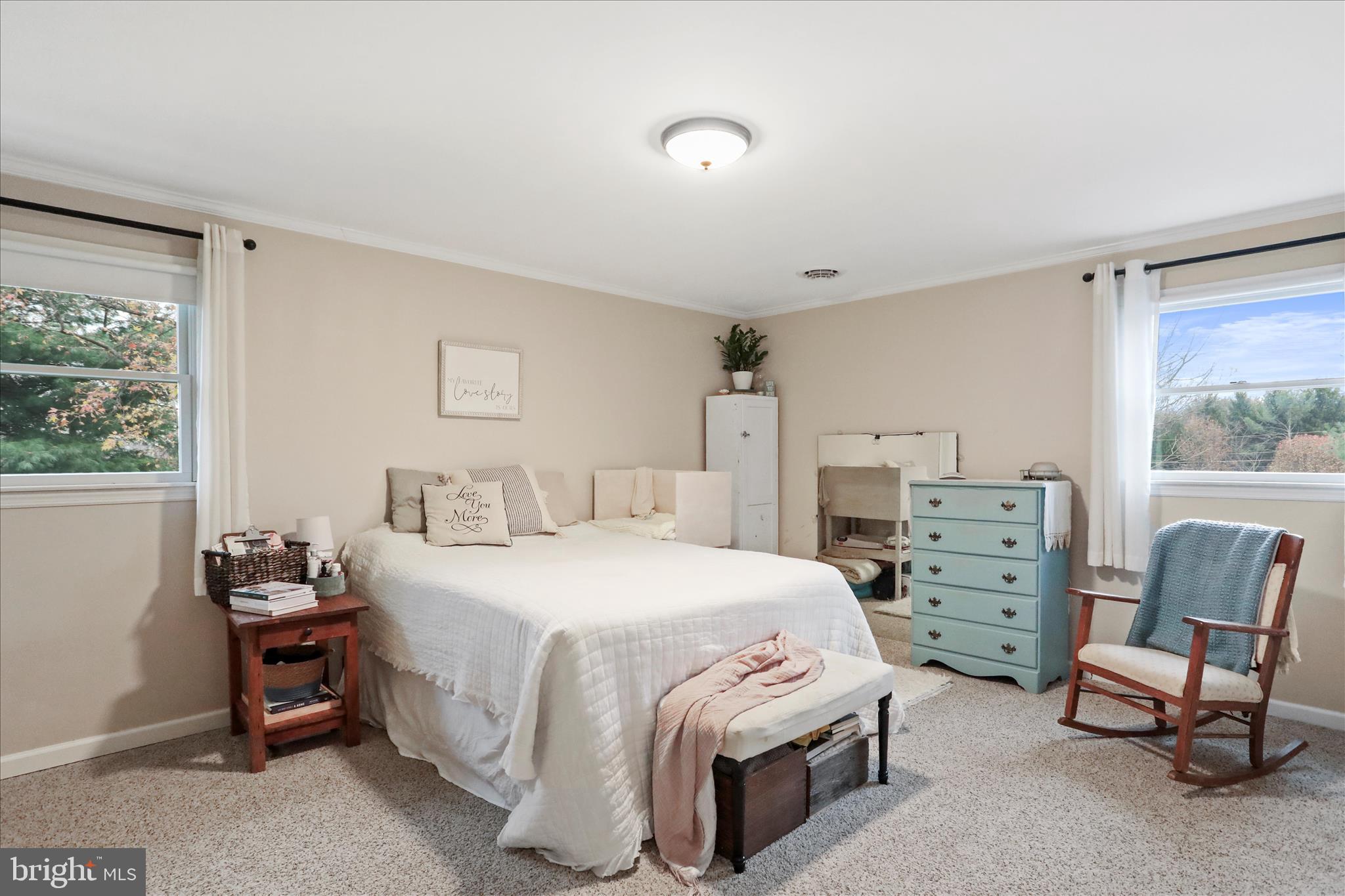 4747 Church Road Chambersburg, PA 17202 - Photo 21 of 49 a bedroom with a bed and a chair