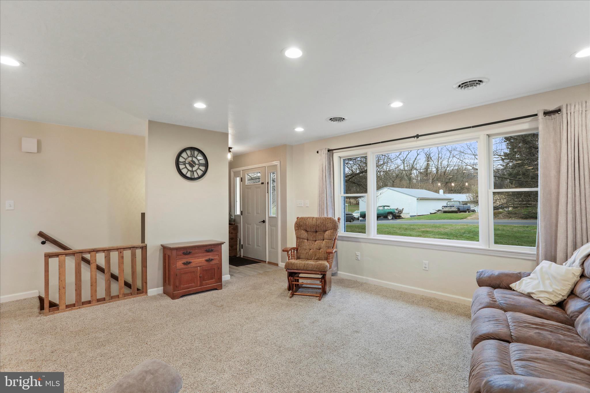 4747 Church Road Chambersburg, PA 17202 - Photo 3 of 49 a living room with furniture and a large window