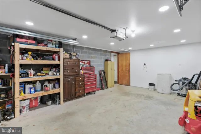 a view of a room with lots of shelves