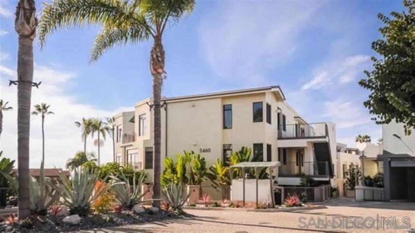 5460 La Jolla Boulevard, Unit G301 La Jolla, CA 92037 - Photo 1 of 12 a front view of multiple houses with yard