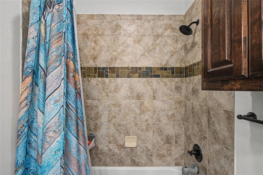 208 Lovers Path Drive Springtown, TX 76082 - Photo 18 of 35 a bathroom with a shower