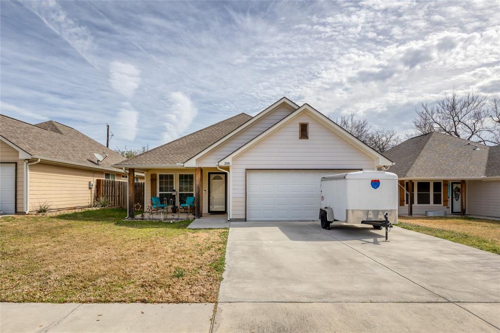 208 Lovers Path Drive Springtown, TX 76082 - Photo 25 of 35 a view of a house with a patio
