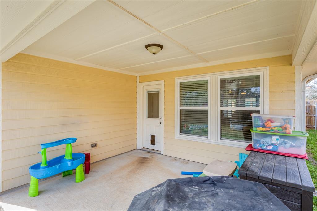 208 Lovers Path Drive Springtown, TX 76082 - Photo 31 of 35 a front view of a house with an empty space and wooden floor