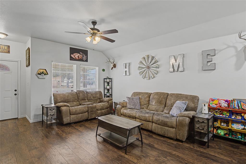 208 Lovers Path Drive Springtown, TX 76082 - Photo 7 of 35 a living room with furniture and a large window