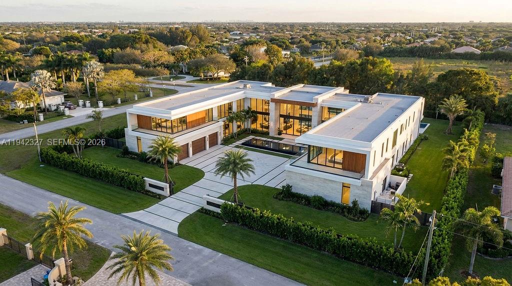 0 Southwest 59th Court Southwest Ranches, FL 33331 - Photo 9 of 11 an aerial view of a house with a garden