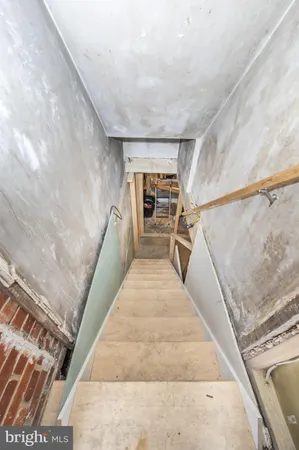 a view of a room with wooden walls