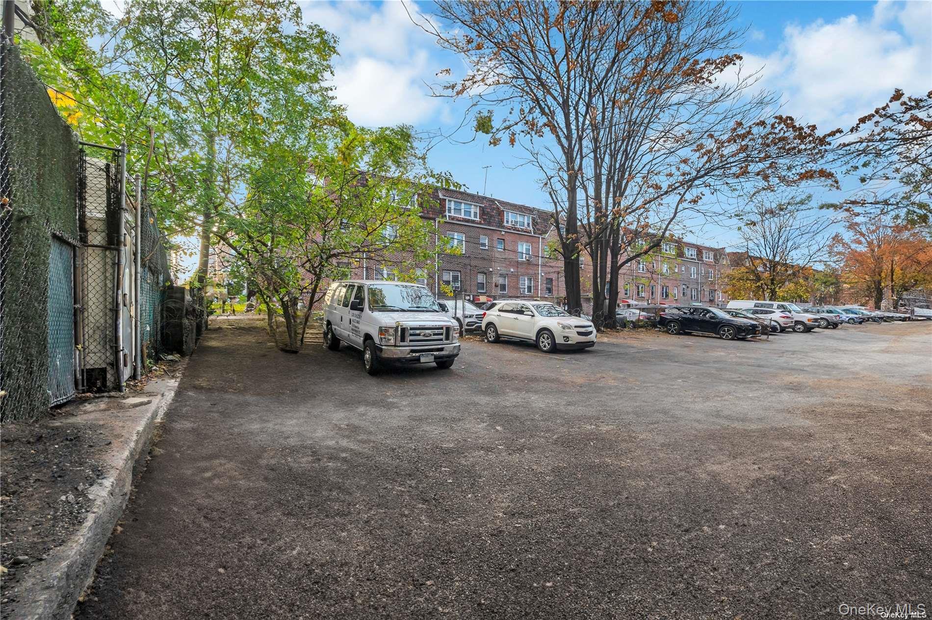 37-58 79th Street Queens, NY 11372 - Photo 7 of 28 a view of street with parked cars