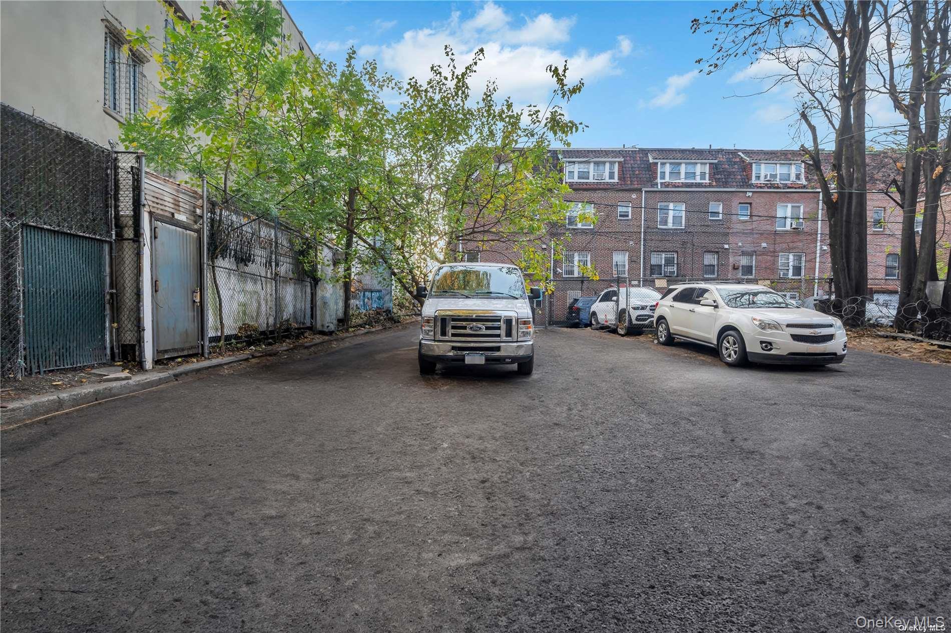 37-58 79th Street Queens, NY 11372 - Photo 8 of 28 a car parked in front of a building
