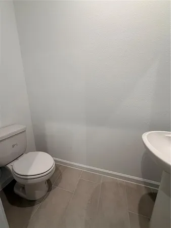 a bathroom with a sink and a toilet