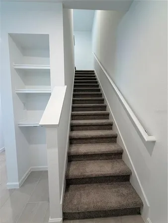 a bathroom with a sink a toilet and vanity