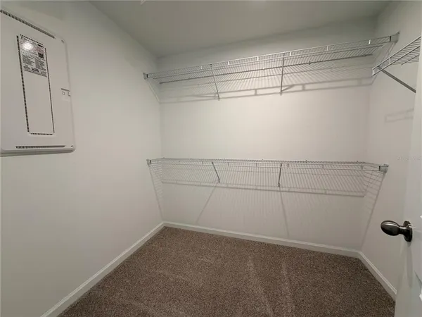 a bathroom with a double vanity sink and mirror