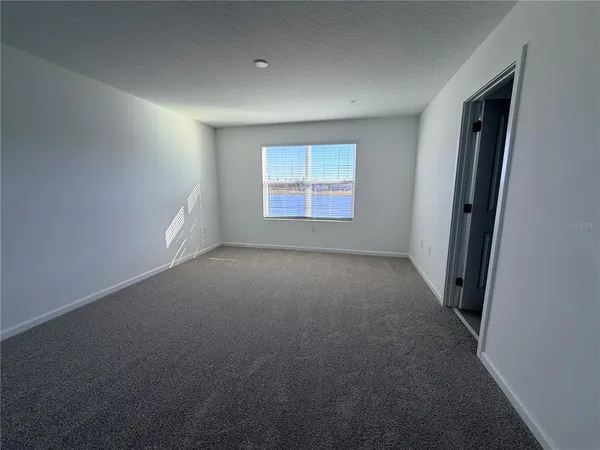 a view of a city with ocean view