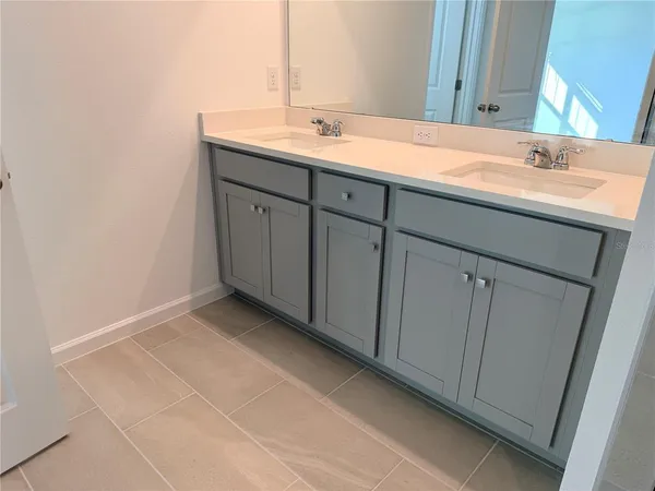 a view of a swimming pool with outdoor seating