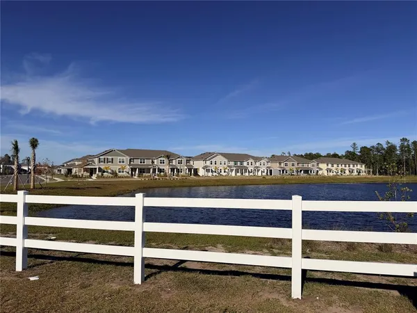 a view of a patio with a table chairs and a patio