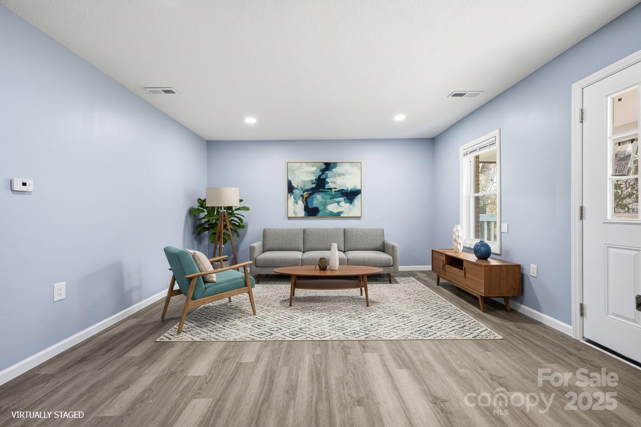 349 Gorman Bridge Road Asheville, NC 28806 - Photo 2 of 39 a living room with furniture and wooden floor