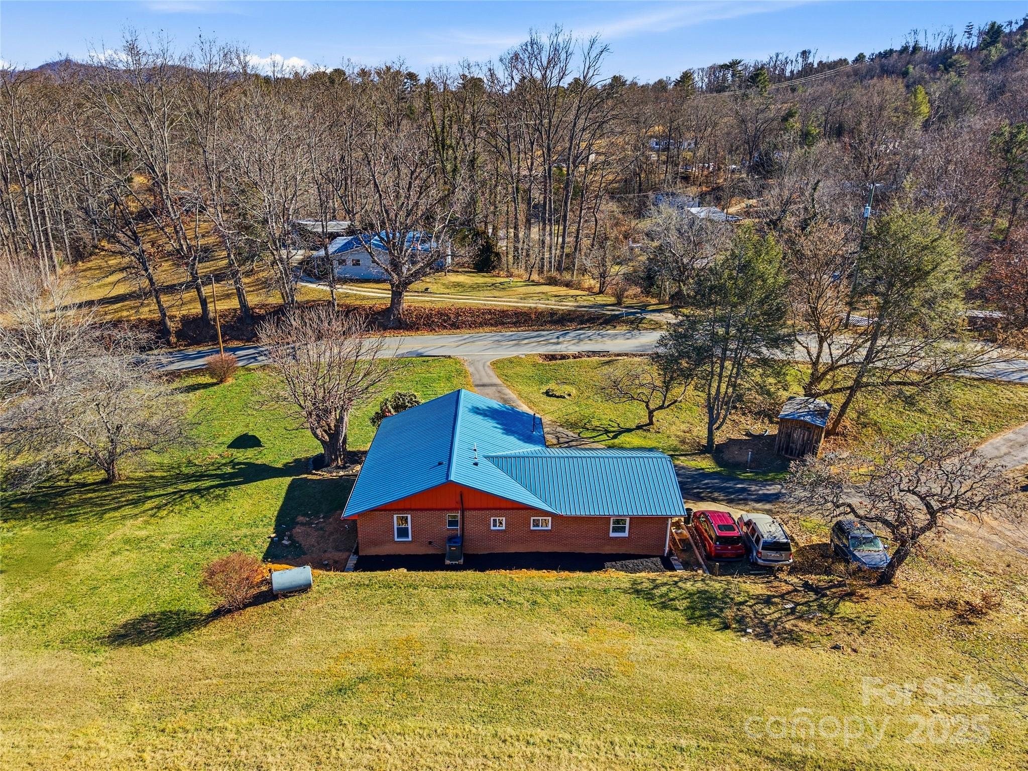 349 Gorman Bridge Road Asheville, NC 28806 - Photo 34 of 39 a view of a house with a yard and sitting area