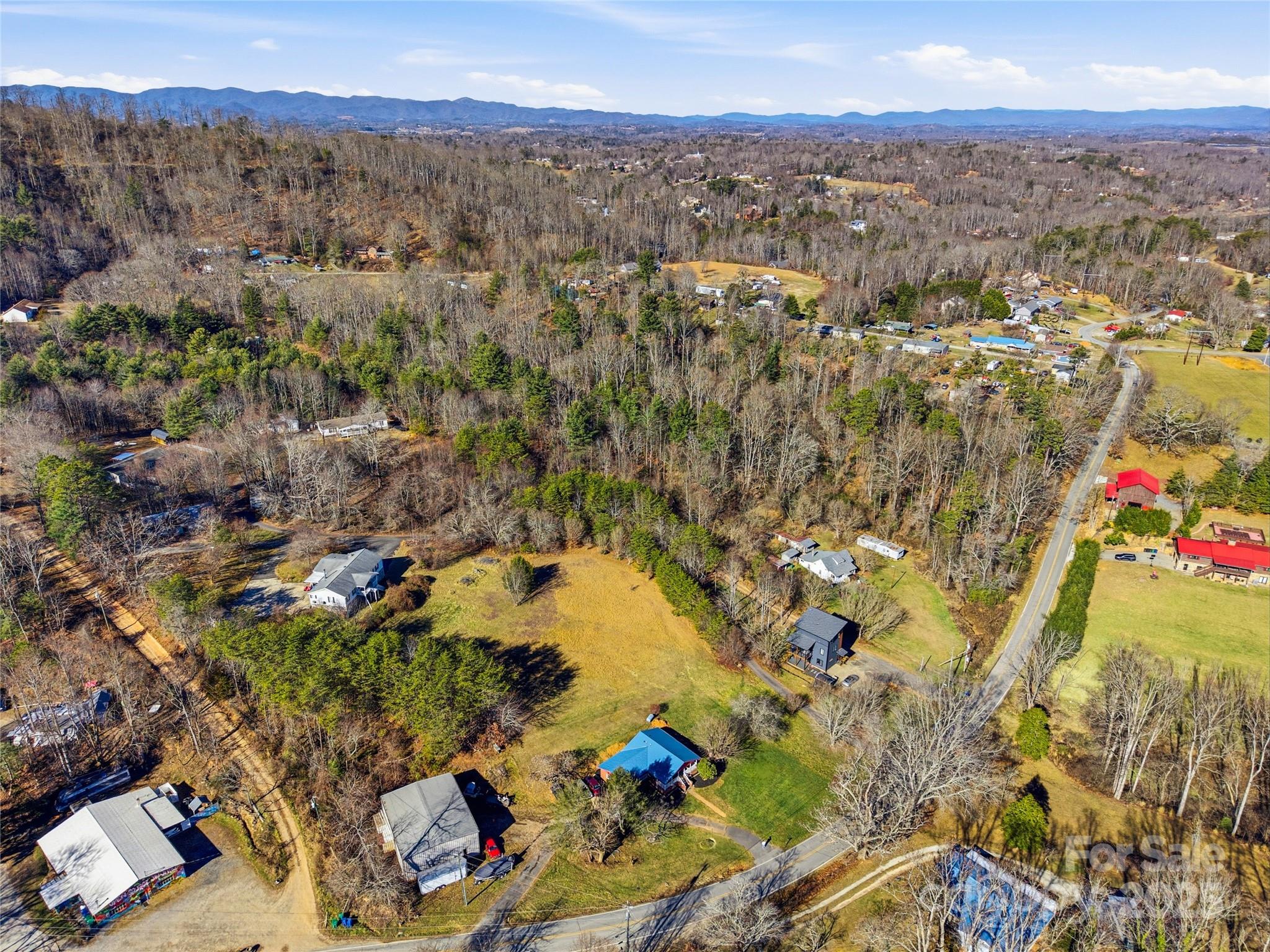 349 Gorman Bridge Road Asheville, NC 28806 - Photo 38 of 39 an aerial view of residential houses with outdoor space