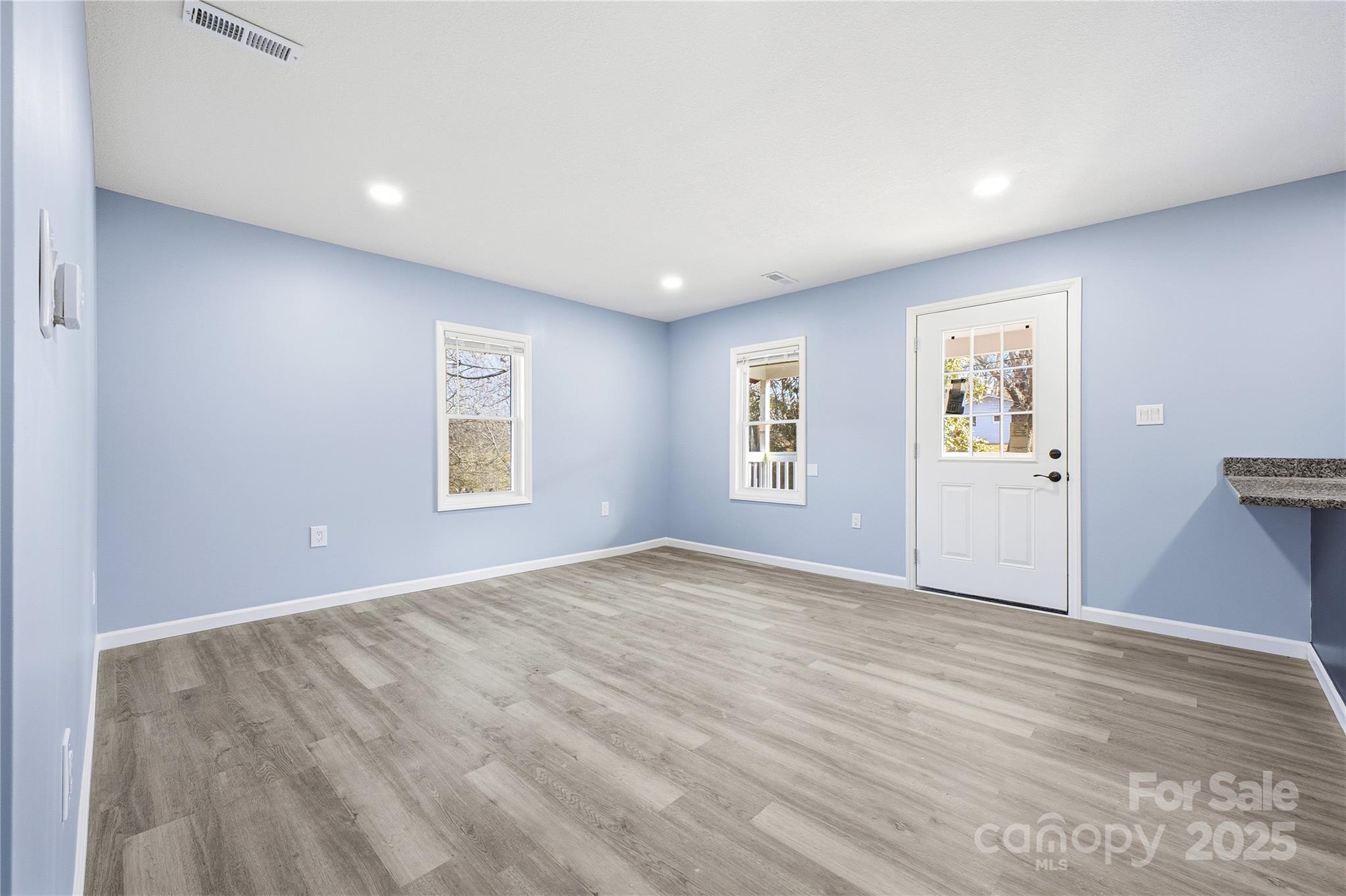 349 Gorman Bridge Road Asheville, NC 28806 - Photo 4 of 39 a view of an empty room with a window