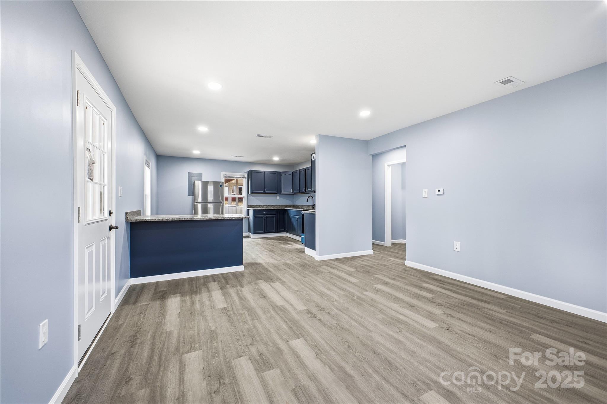 349 Gorman Bridge Road Asheville, NC 28806 - Photo 5 of 39 a view of kitchen cabinet and wooden floor