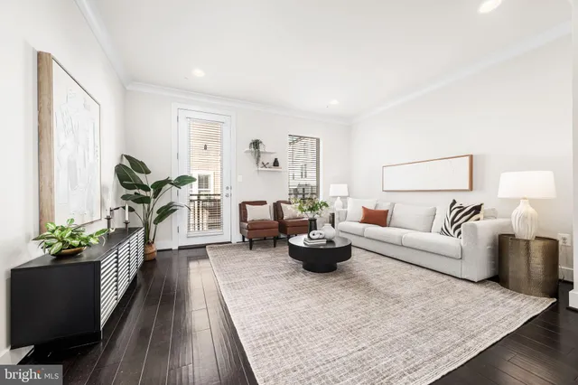 a living room with furniture and a couch