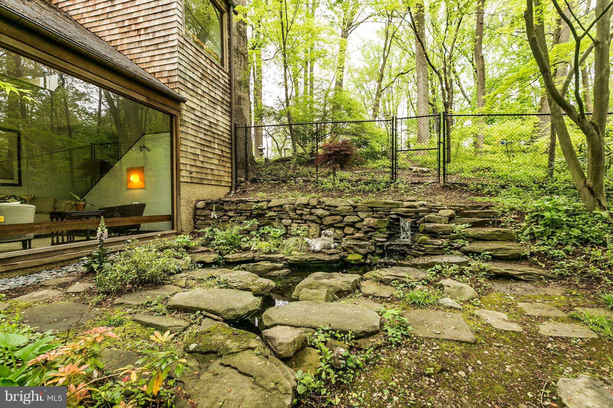 919 Rolandvue Road Towson, MD 21204 - Photo 28 of 30 Garden with Pond & Waterfall