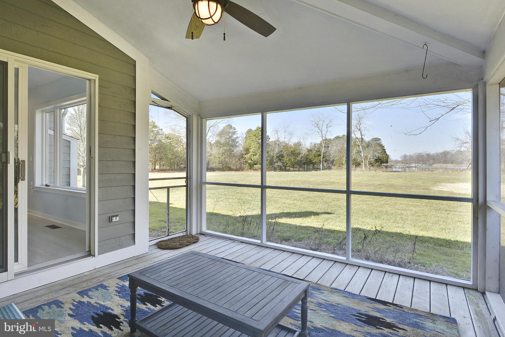 1310 Chancellor Point Road Trappe, MD 21673 - Photo 20 of 29 Screened porch off Master