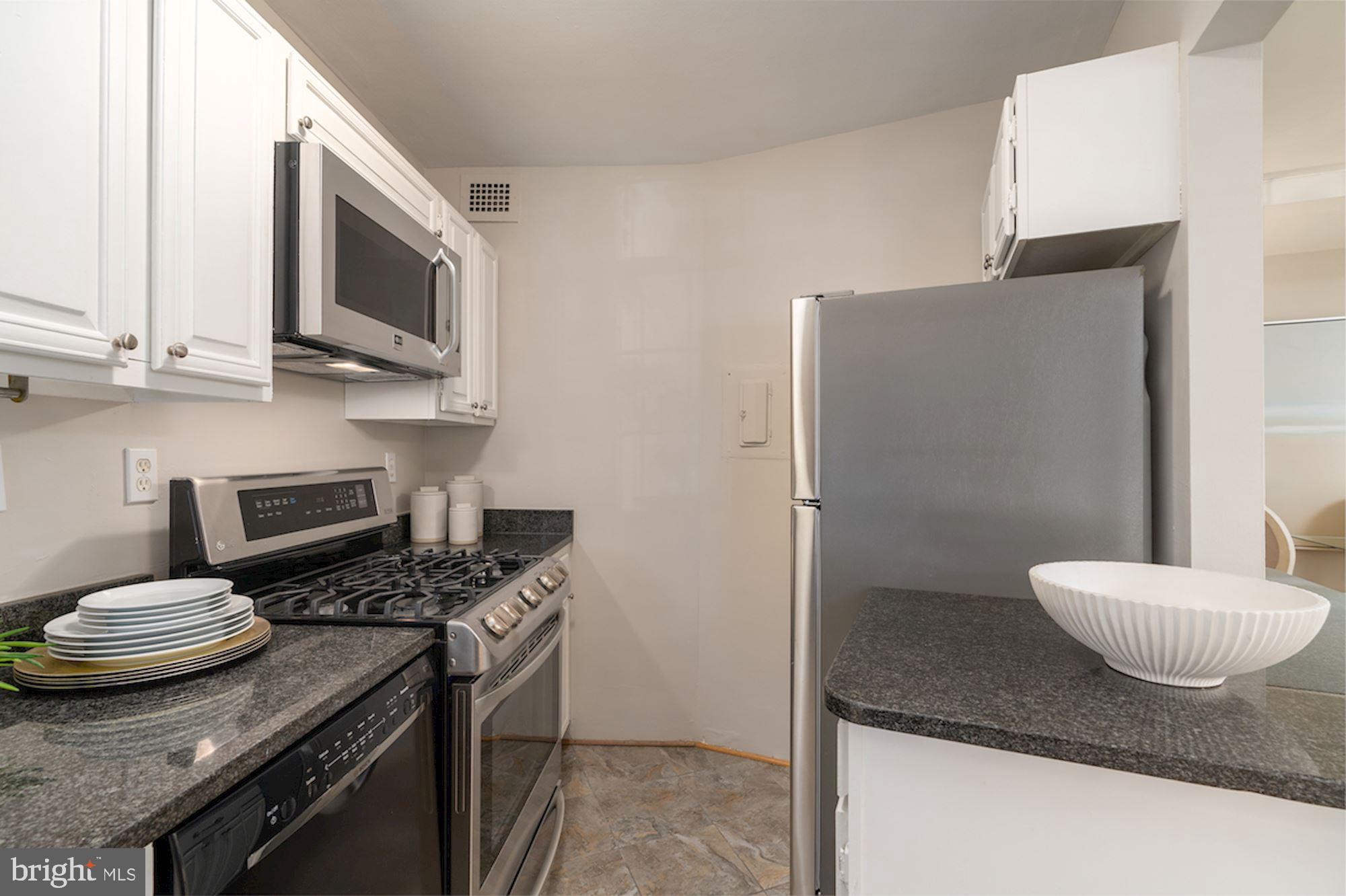 1880 Columbia Road Northwest, Unit 102 Washington, DC 20009 - Photo 17 of 25 New LG range and microwave oven