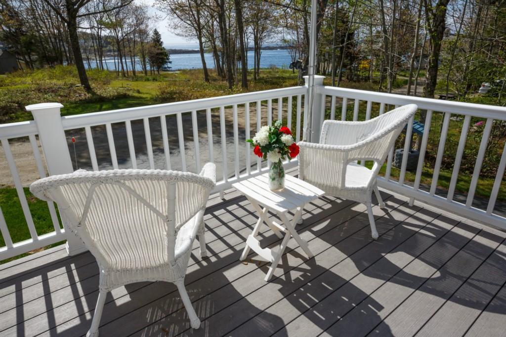8 Hackelton Road Chamberlain, ME 04541 - Photo 4 of 28 Front Porch with easy Maintenance Deck