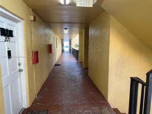 a view of a chairs and table in the patio