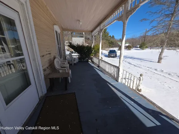a kitchen with a refrigerator and a stove